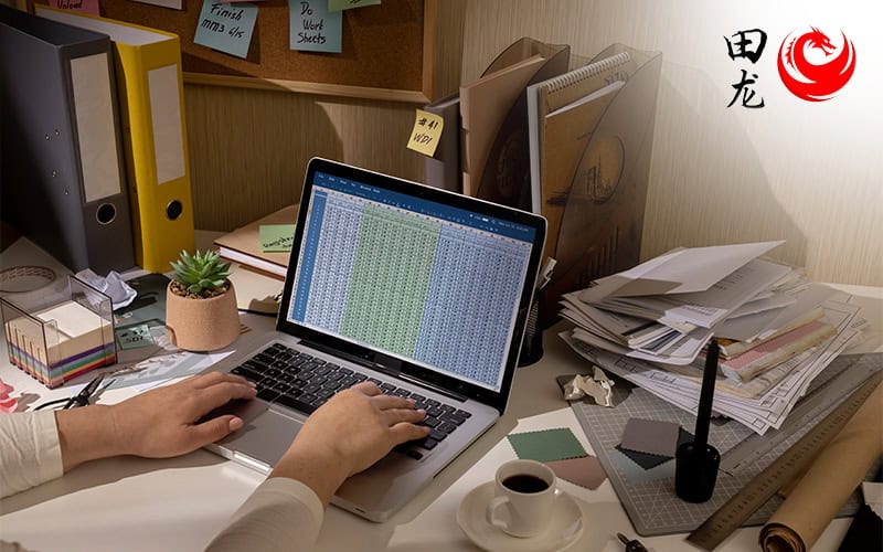 An individual performing bookkeeping task