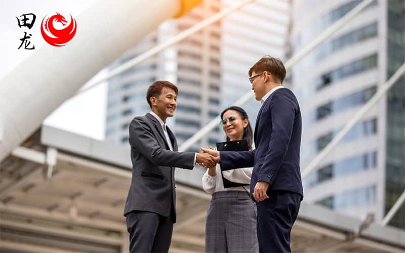 Business partners shaking hands